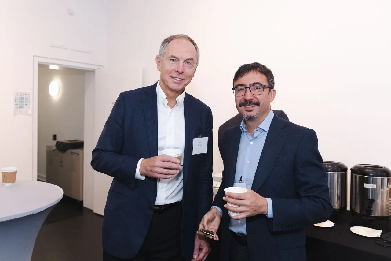 Two people with coffee.