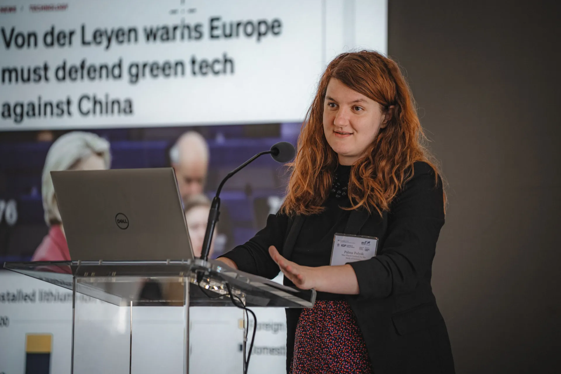 Woman giving presentation.