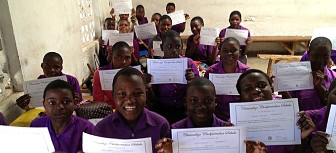 Children holding certificates